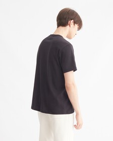 ESSENTIALS LOGO GRAPHIC TEE, BLACK BEAUTY, hi-res