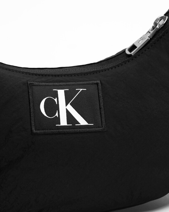 CK CITY MINI HALF MOON CROSSBODY  BAG