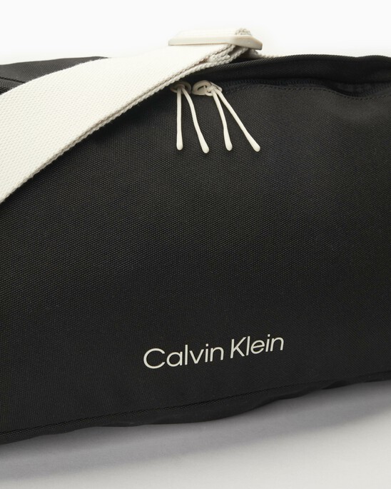 CK ATHLETIC SLING BAG XL