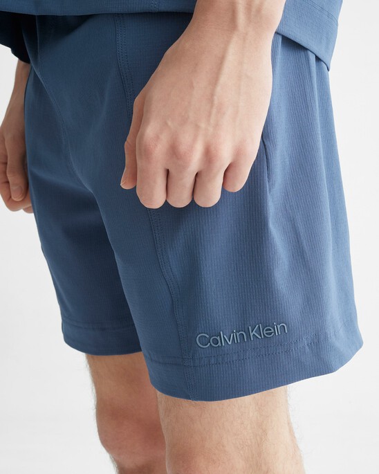 ESSENTIALS WOVEN SHORTS