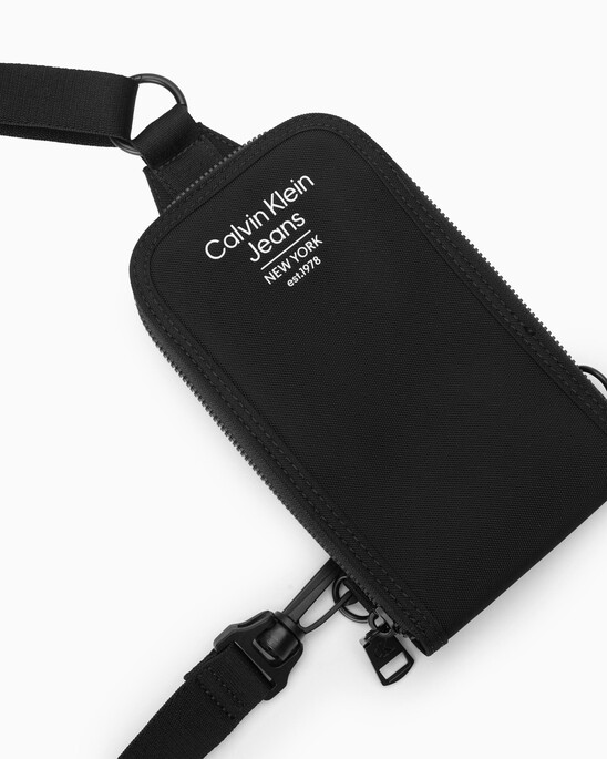 SPORT ESSENTIALS CONVERTIBLE PHONE CROSSBODY BAG