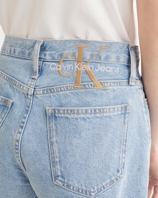 WASHED MID LENGTH FRAYED DENIM SHORTS