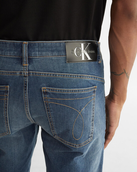 ULTIMATE STRETCH BODY TAPER JEANS