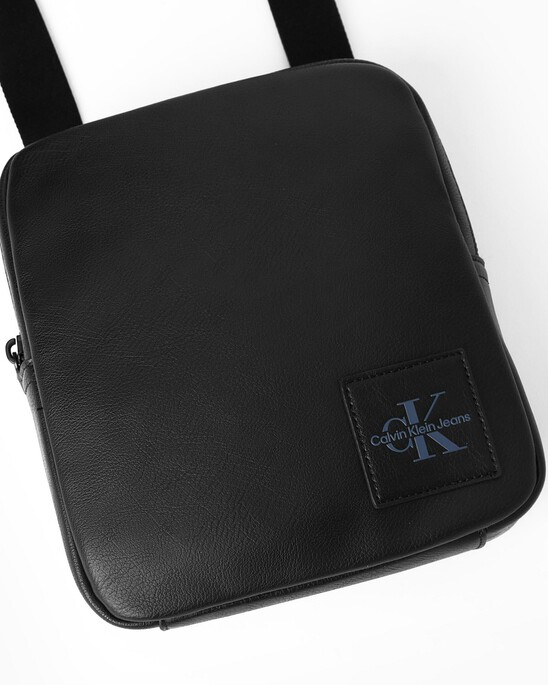 TAGGED REPORTER BAG