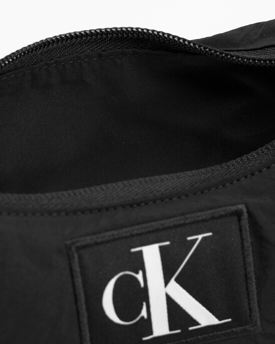 CK CITY MINI HALF MOON CROSSBODY  BAG
