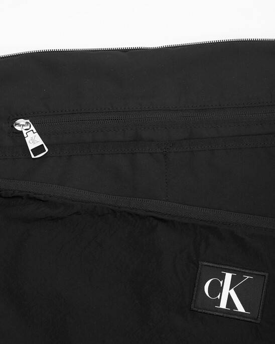 CK CITY CINCHED SLING BAG