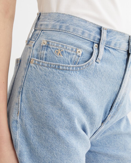 WASHED MID LENGTH FRAYED DENIM SHORTS